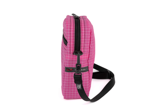An Everyday Cubelet in Cerise Halcyon (pink with a white grid).